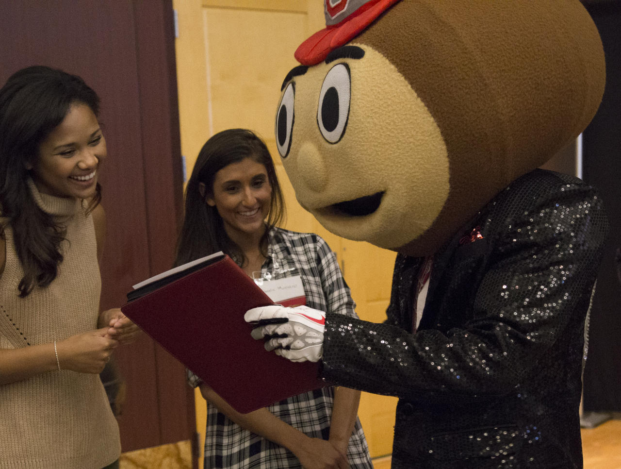 Brutus showing his resume to employers