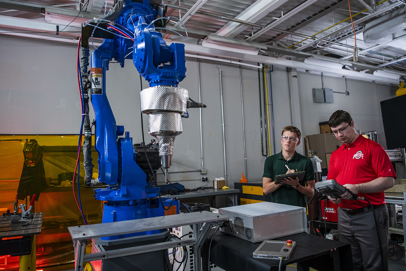 Students working on a milling machine