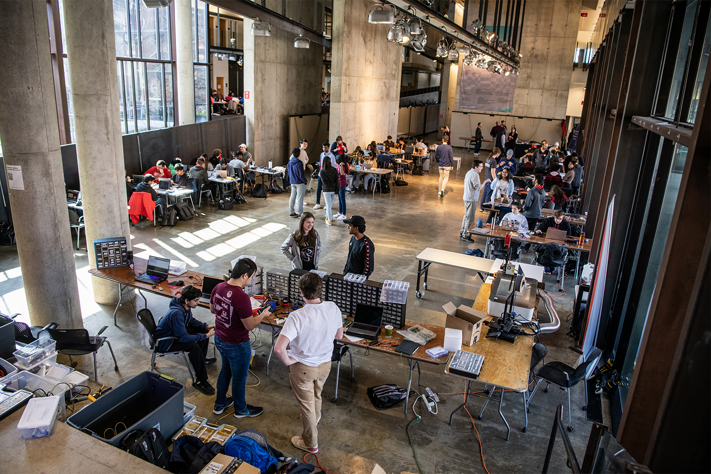Bustling floor of Knowlton with different booths