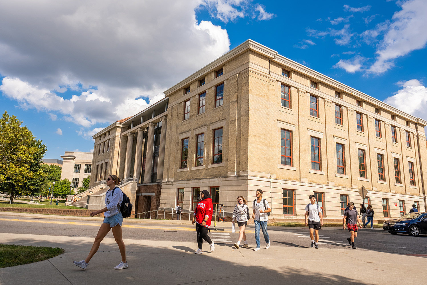 Sunny shot of students walking across campus