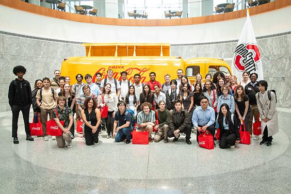 large group of people posing for a photo
